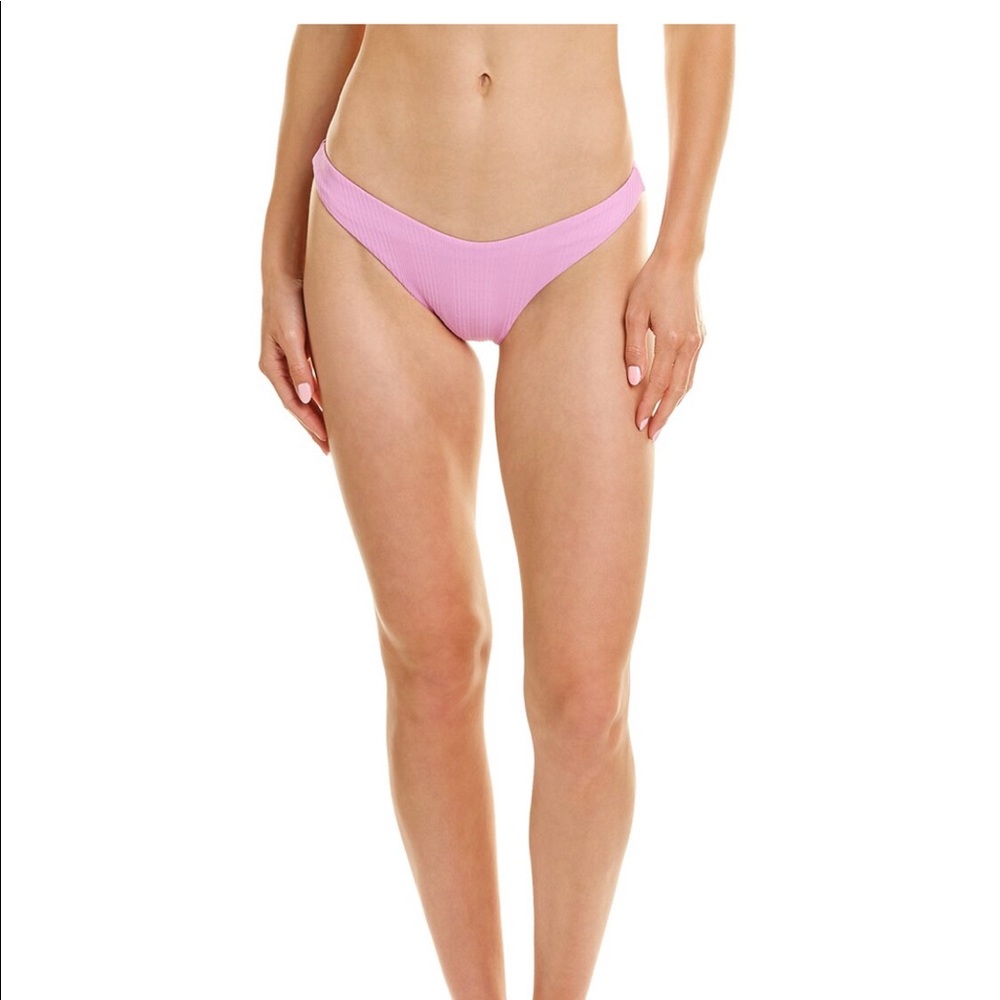 L’space Cabana Bottom in rosebud with pointelle rib design.
Minimal coverage